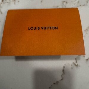 Louis Vuitton receipt case